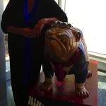 Raeleen pictured here with the music department version of the Butler Bulldog mascot. They call him Wolfgang AMADOGUS Mozart!